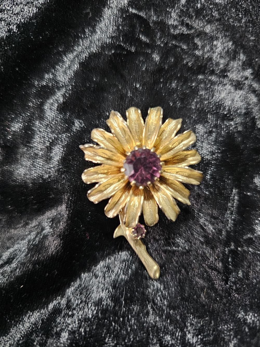 Gold Floral Brooch with Purple Gem Accent